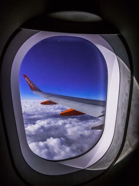 Through airplane window view, aircraft window, Hublot, during 